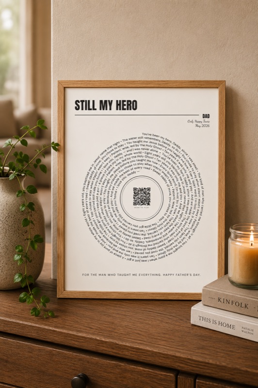 Framed lyric artwork: the song's words spiral into a record with a scan-to-play code at the center